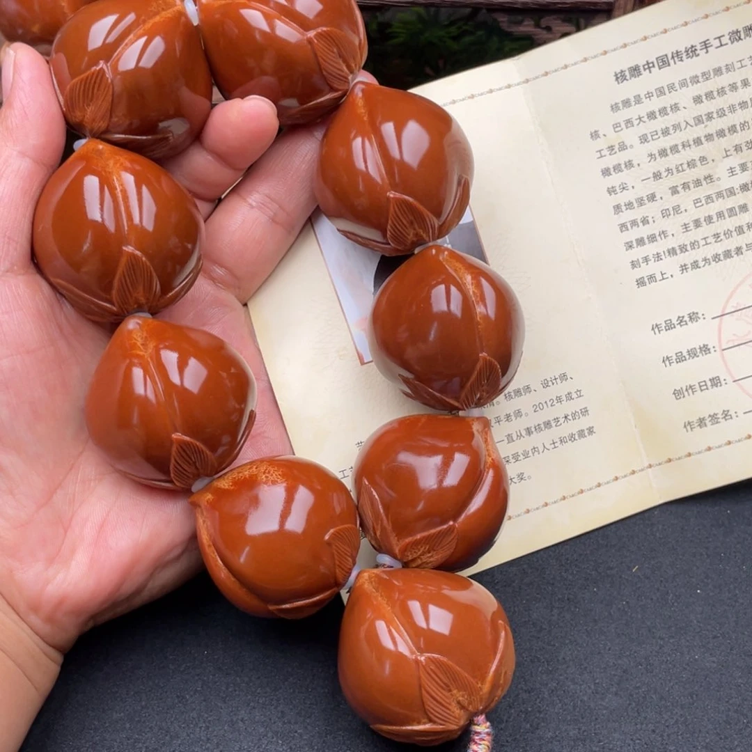 橄榄核吊坠寿桃38手持