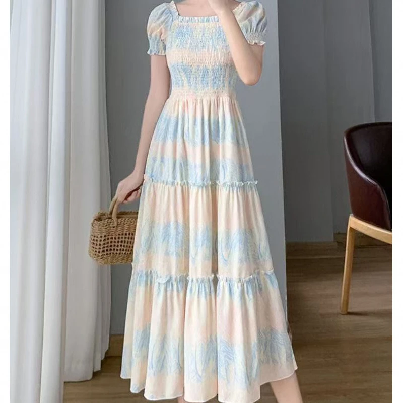 茶歇法式桔梗甜美小清新碎花连衣裙女夏设计感木耳边海边度假长裙