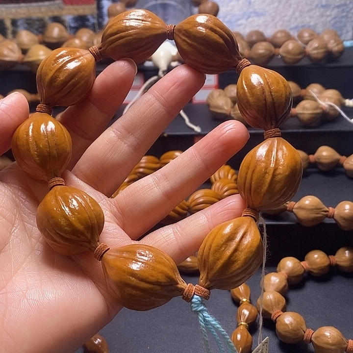 尘***火橄榄核手串四花23×33