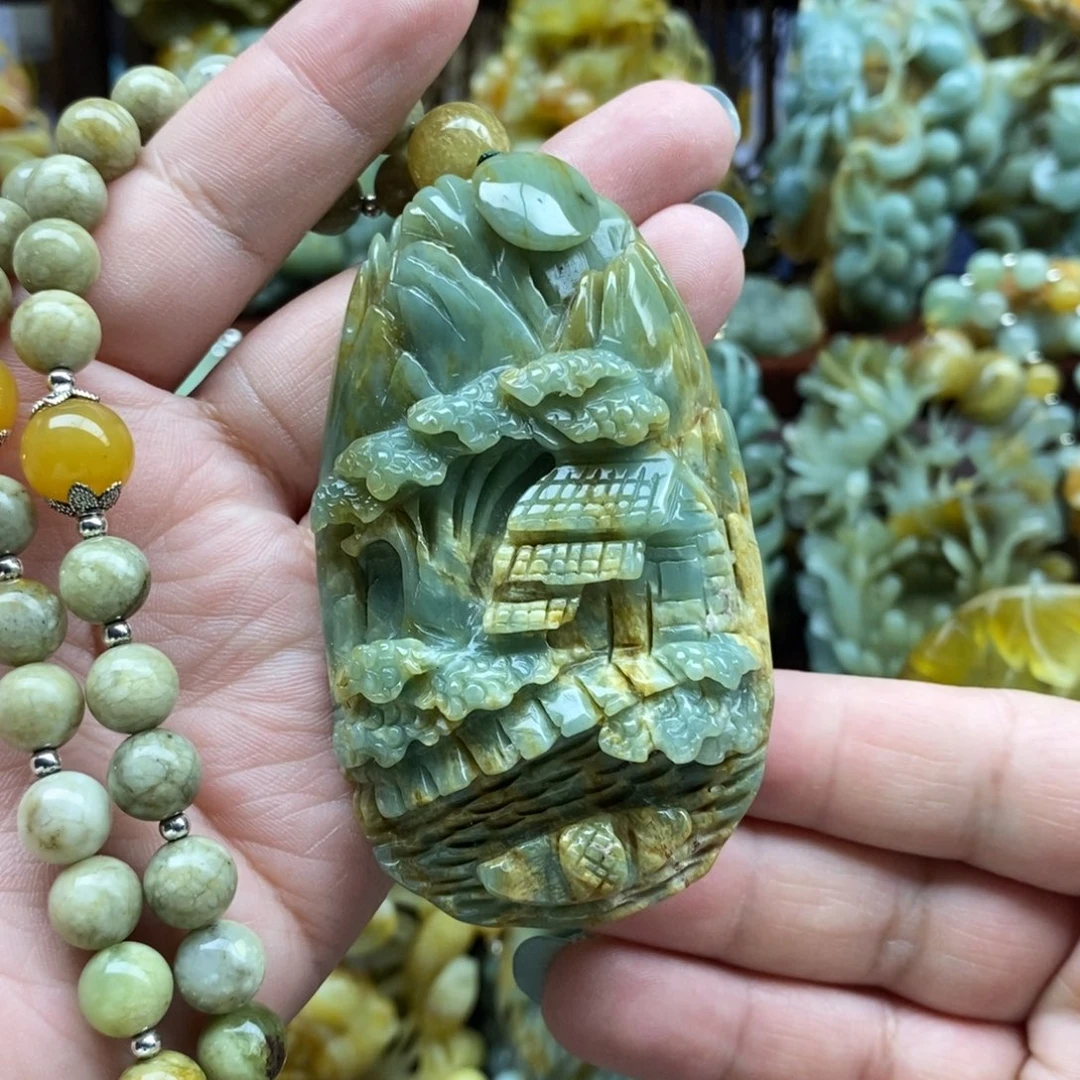 蛇纹石玉颈饰未镶嵌山水牌