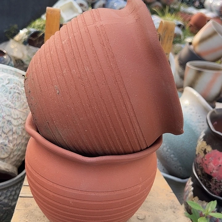 花盆紫砂口20高18。。。。。。。。。。。。。