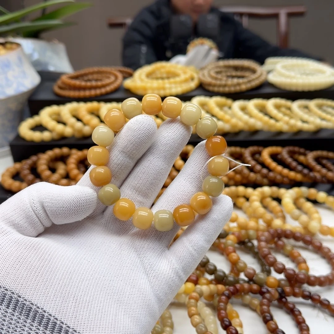 手串菩提根/象牙果12*13精工5年