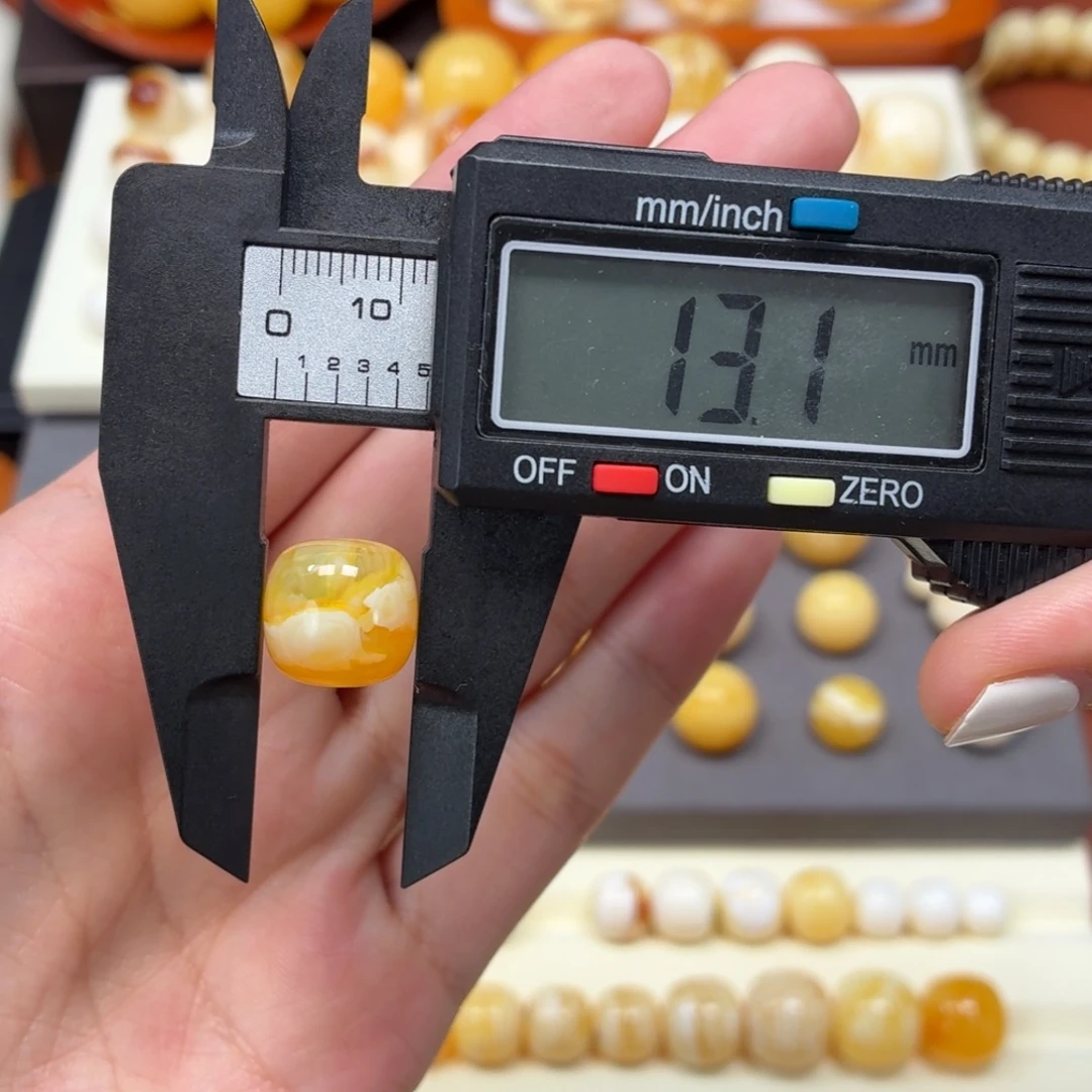 琥珀未镶嵌珠宝奇石焦皮金橘白溶洞荧光老型13mm