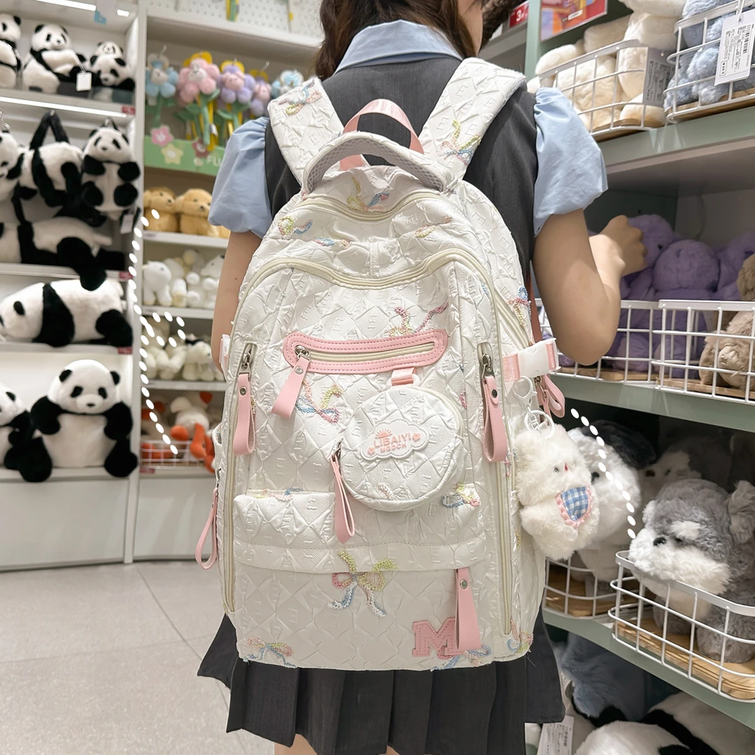 2025新款初中生小学生书包女少女感双肩包高中大学生轻便减负背包