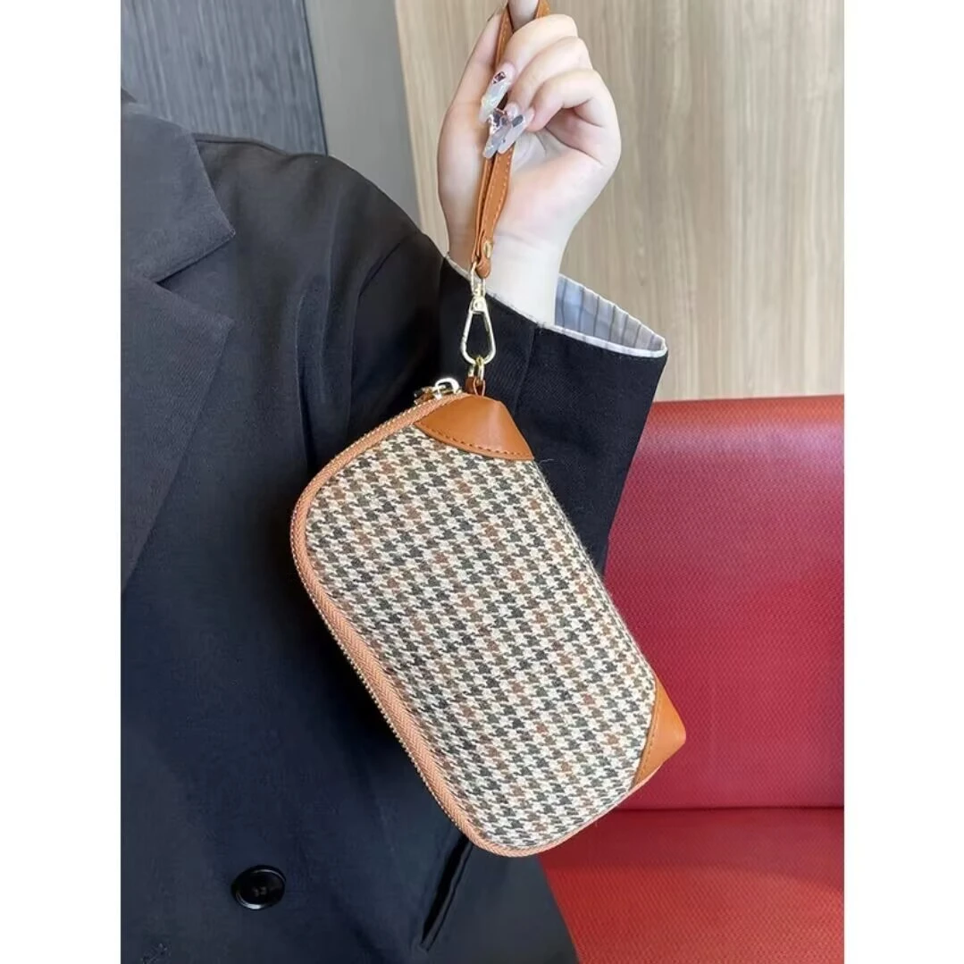 贝壳手机零钱手拿包女士化妆包高档简约ins包新款轻便大容量钱包