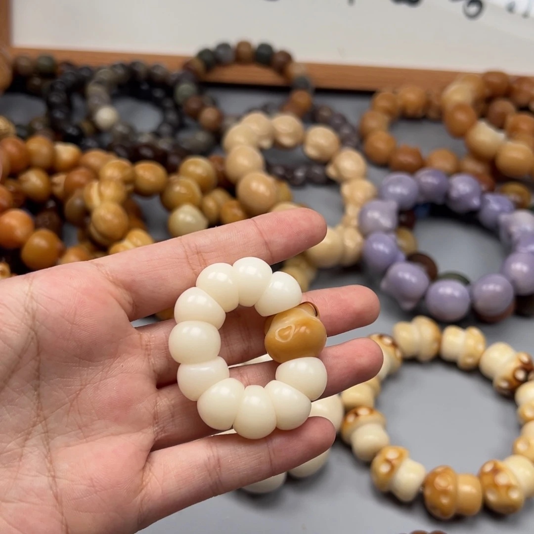 菩提根/象牙果吊坠A595蒜瓣13mm通货一串随机