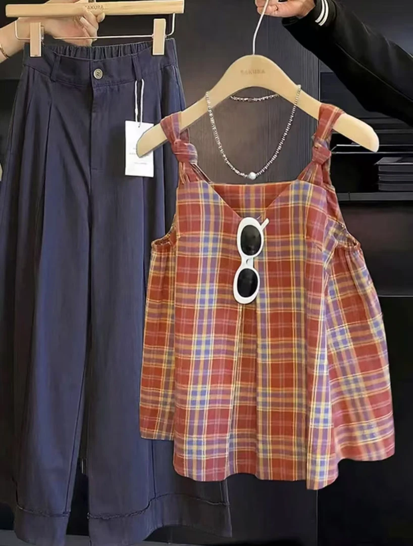 设计感扭结格子吊带背心女夏季2025新款外穿泰式独特绝美无袖上衣