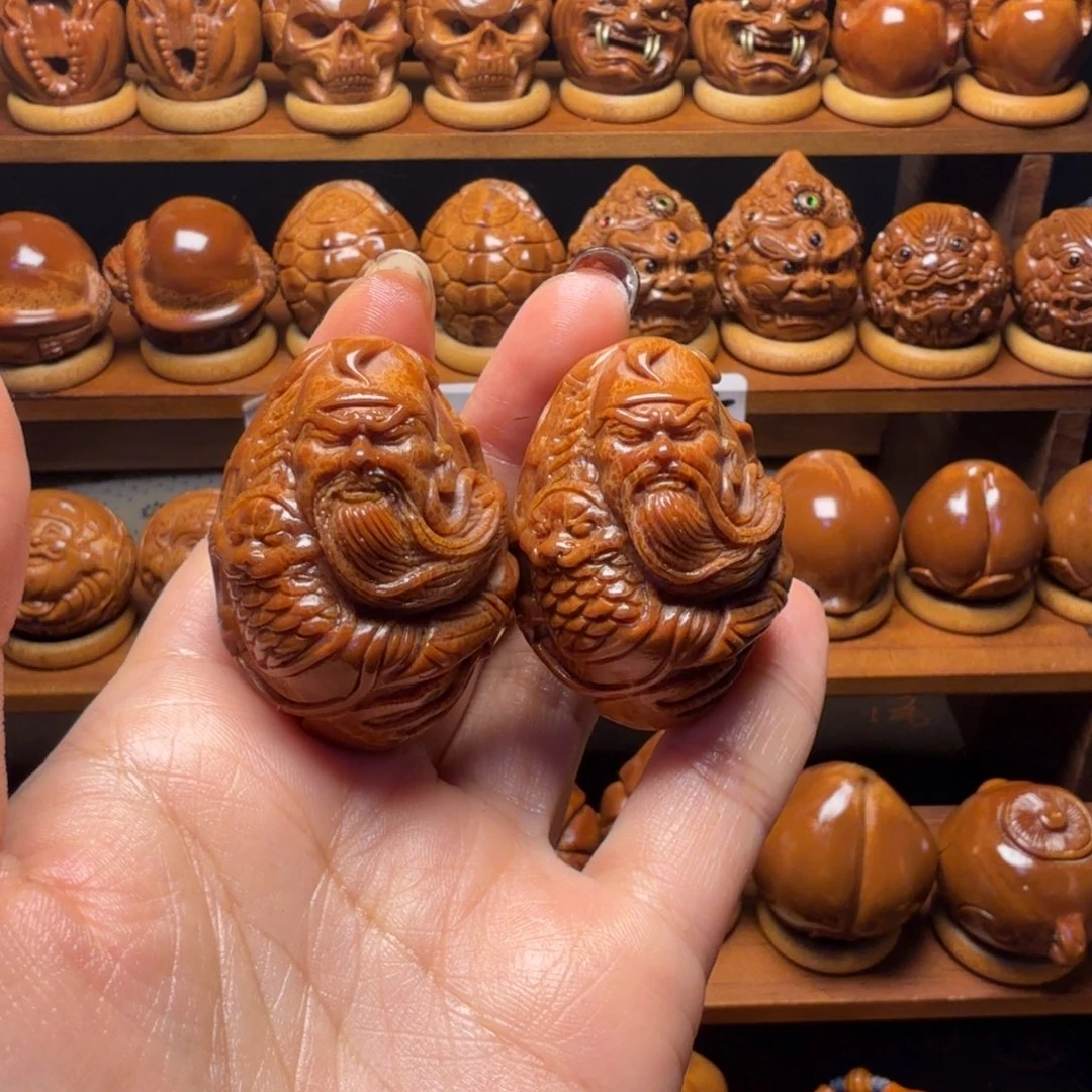 橄榄核把件关公一对