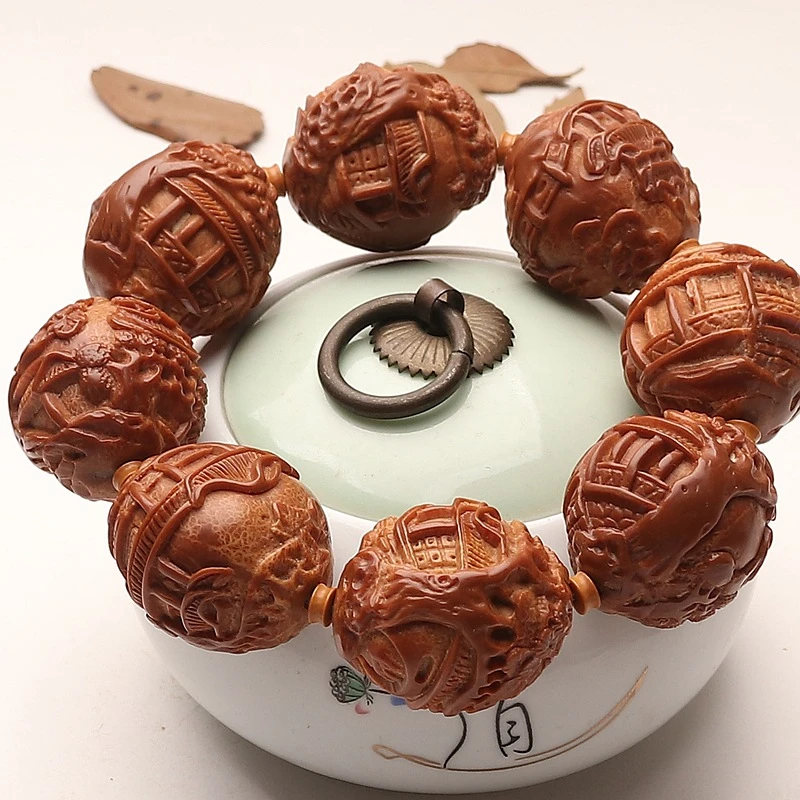 风景进口印尼超大橄榄核雕刻浮雕手串文玩手把件苏州桃核3.2x3.4