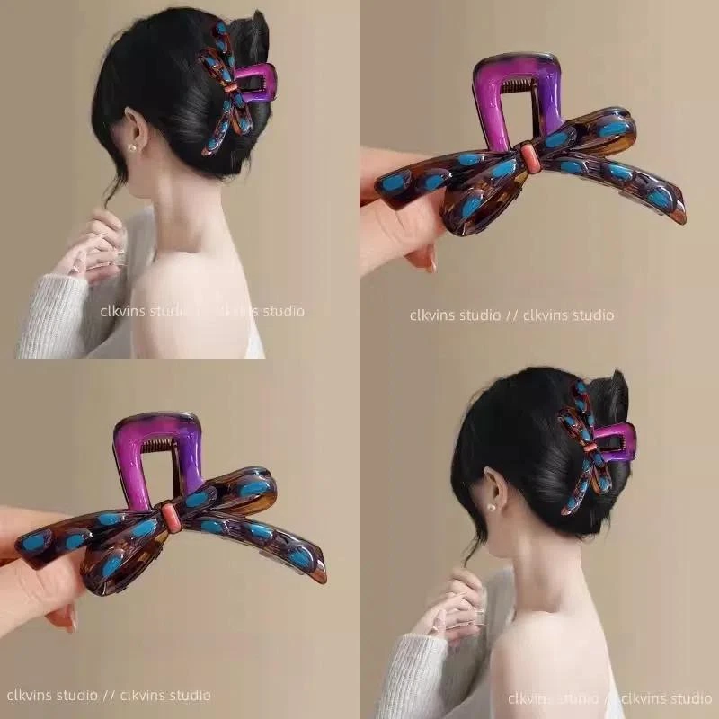 幻彩多巴胺~滴油蝴蝶结抓夹女新款高级感鲨鱼夹春旅行ins风发卡
