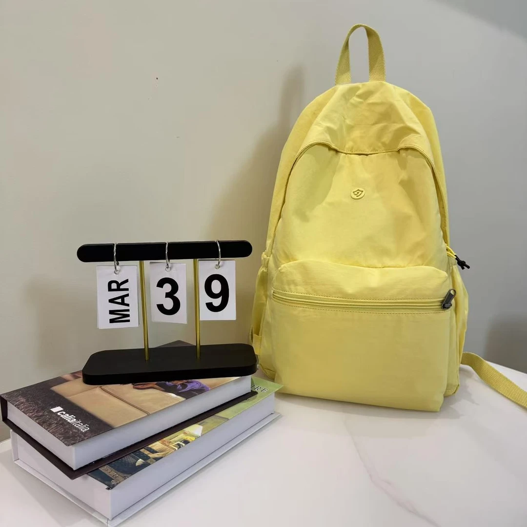 时尚日式双肩包小学生多口袋款中学生学院风电脑包可折叠带挂件