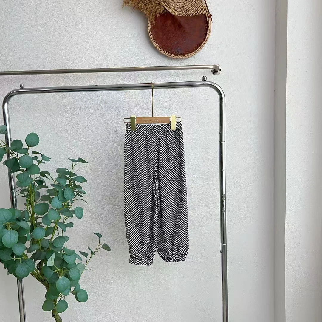 7100糯黑白格梭织长裤