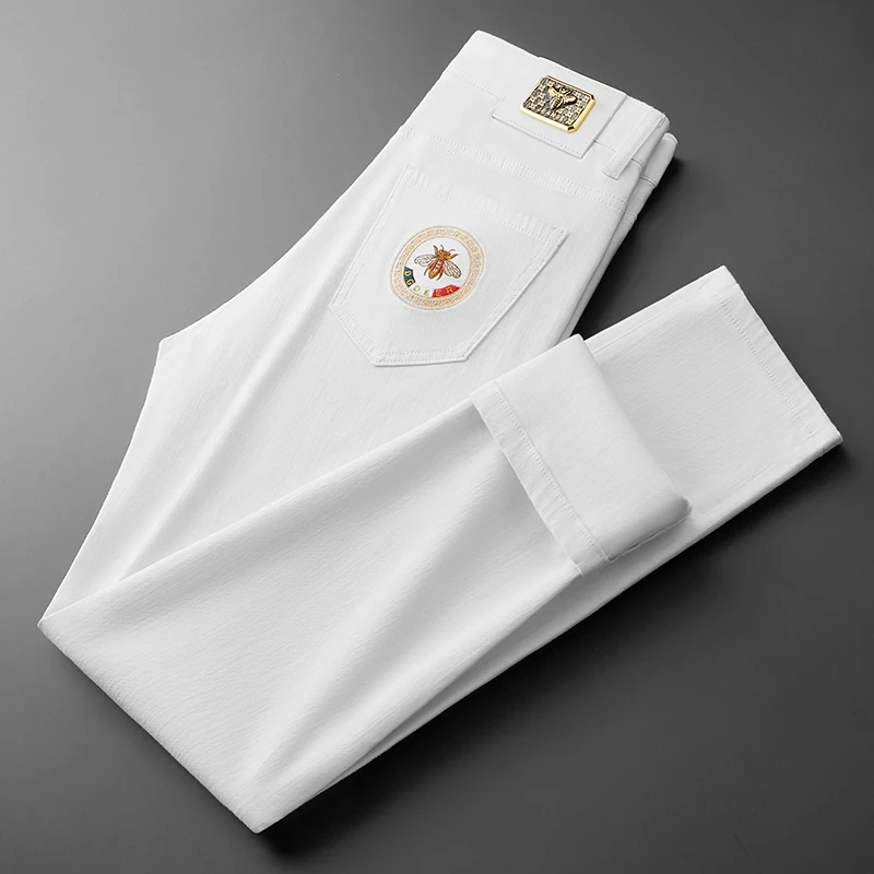 白色牛仔裤男士秋冬新款高端轻奢商务欧货潮牌刺绣直筒裤男休闲裤