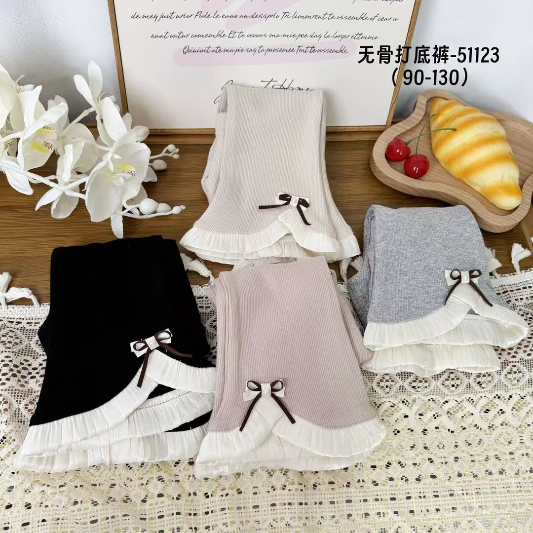 51123笑不点蝴蝶结花边喇叭打底裤