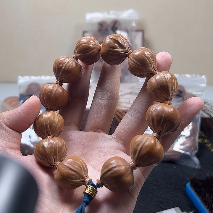 橄榄核吊坠2.4四花