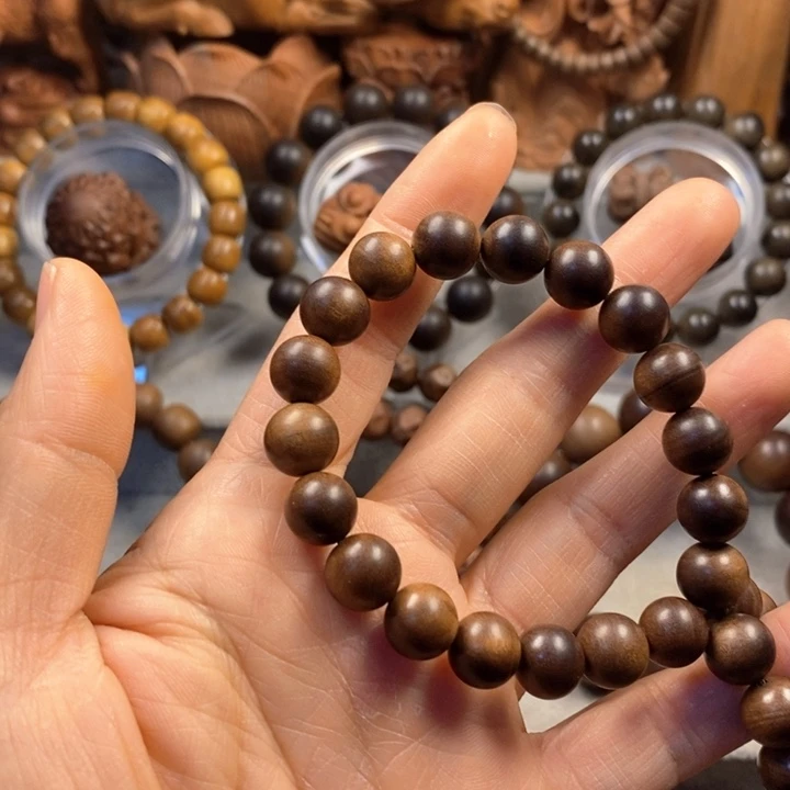 逍***子檀香木手串/手链老山檀奶香味1.9红黑肉