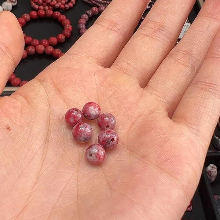 天然辰砂生****业朱砂原石散珠