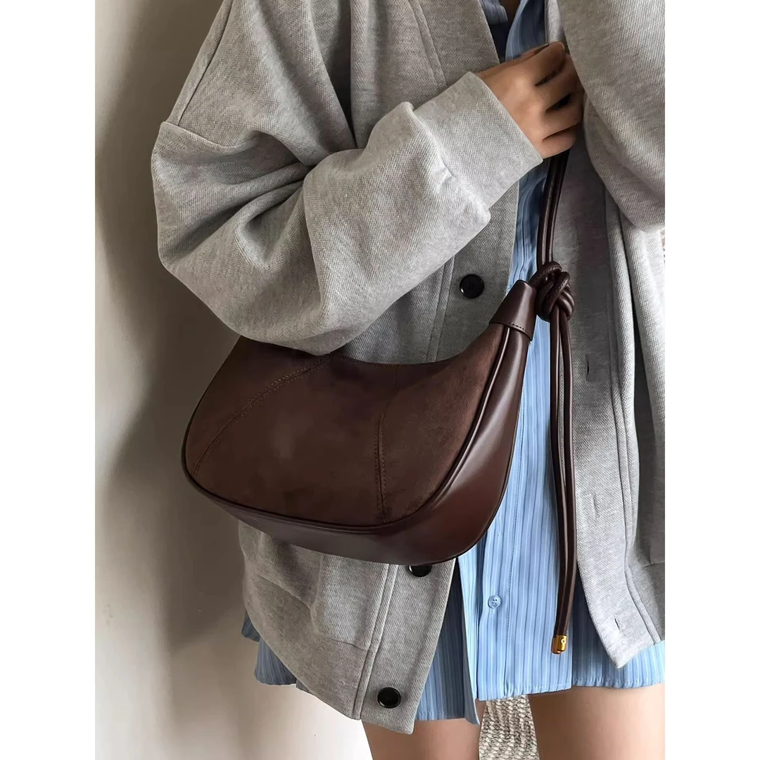 高级感休闲复古2025新款女包牛角包饺子包腋下包简约通勤大容量