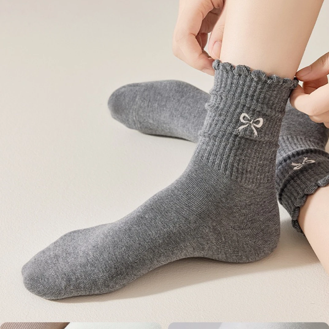 蝴蝶结纯棉中筒堆堆袜子女春秋季防臭吸汗日系可爱百搭白色长袜