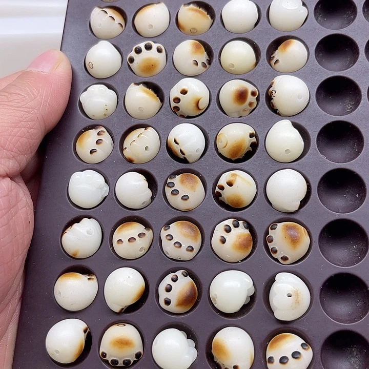 白玉菩提吊坠瑕疵猫爪50颗