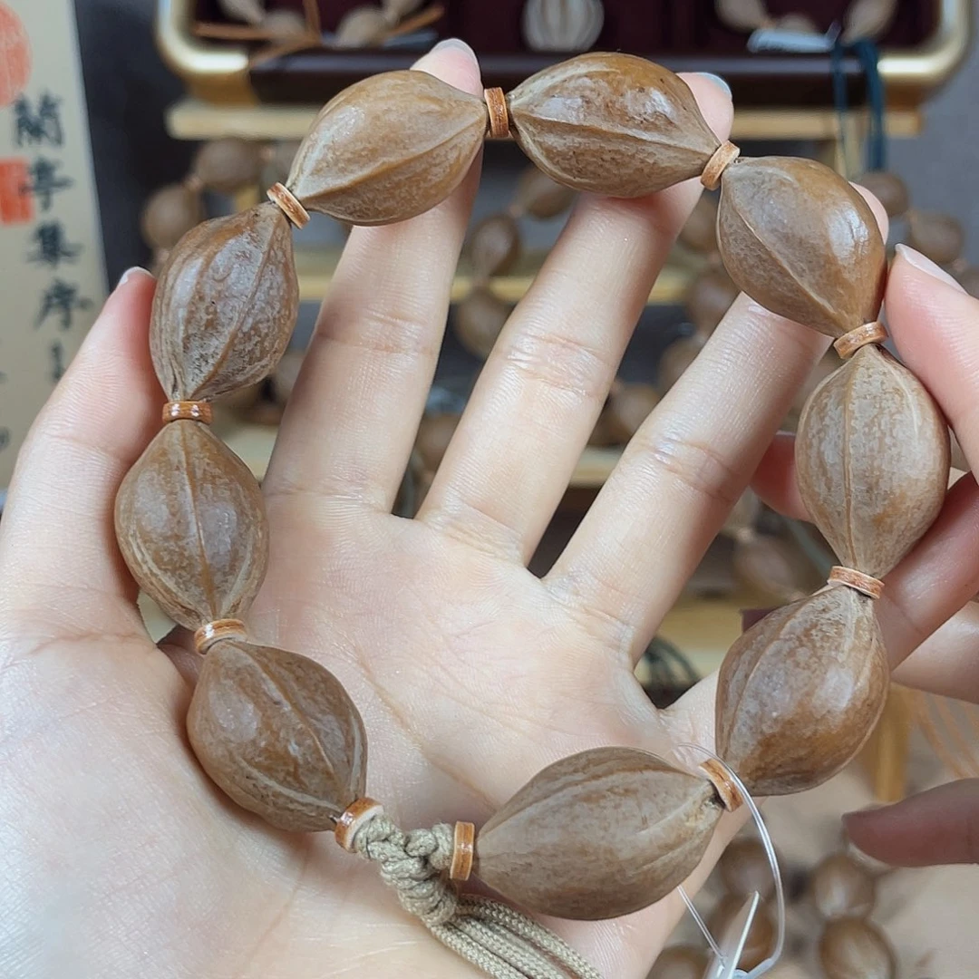 枫***恋橄榄核手串梅林铁核1828