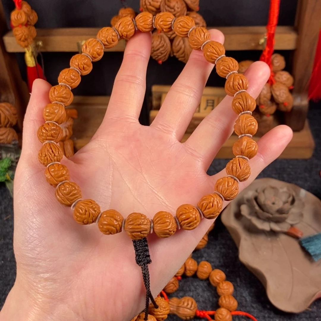 吊坠桃核新**往桃枭手持