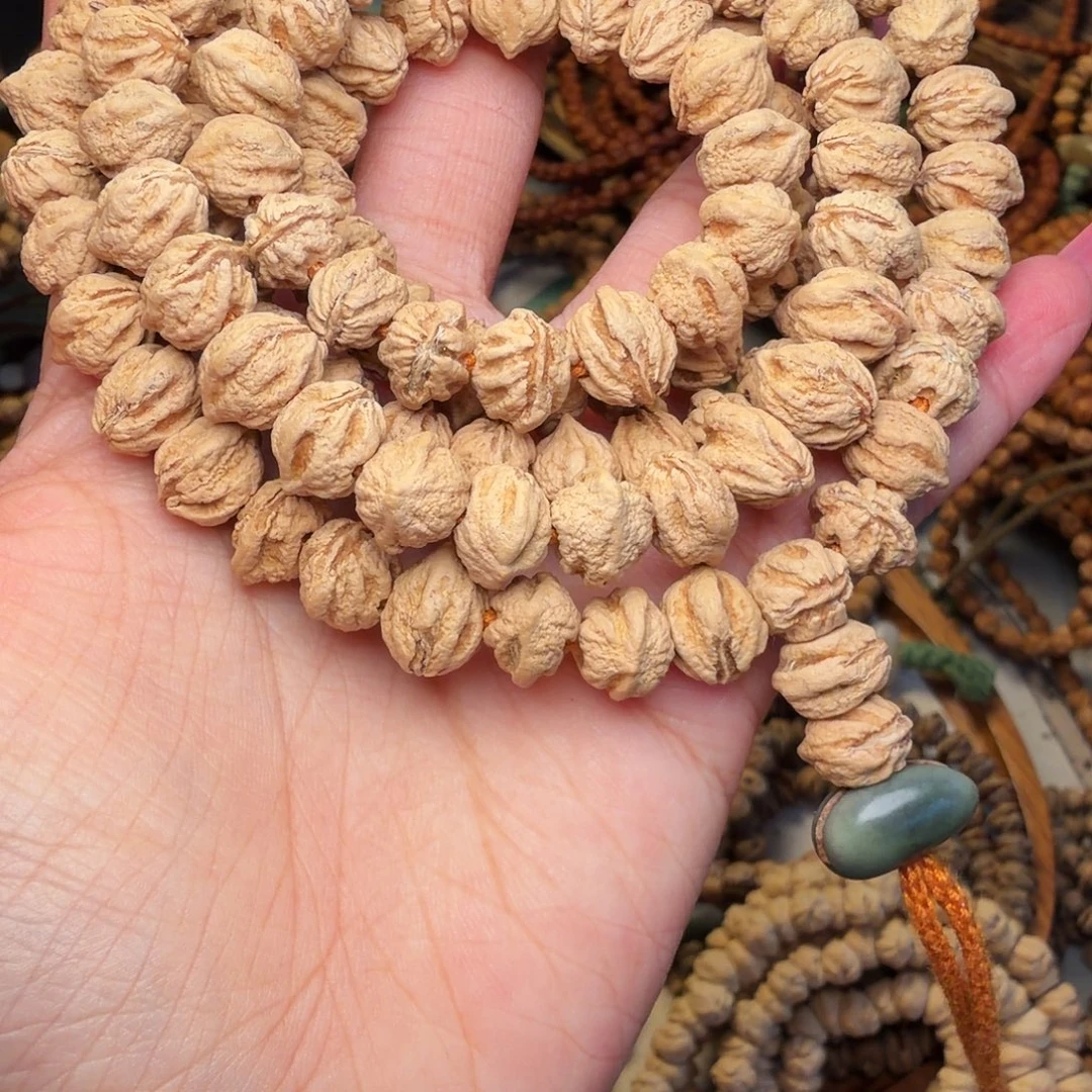 罗***尼柏香籽/百香籽吊坠