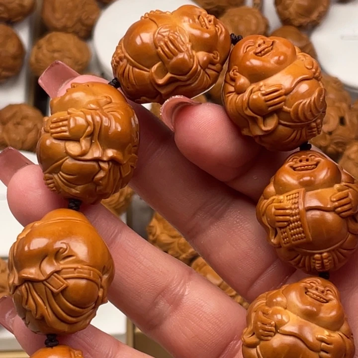 張***、橄榄核吊坠橄榄核