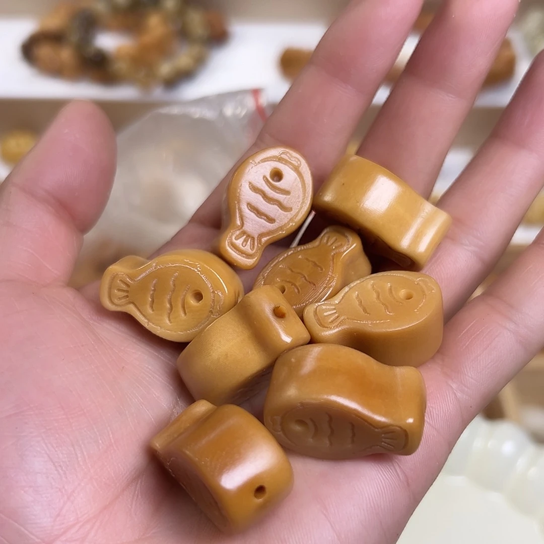 菩提根/象牙果吊坠2颗咖色鱼饼瑕疵