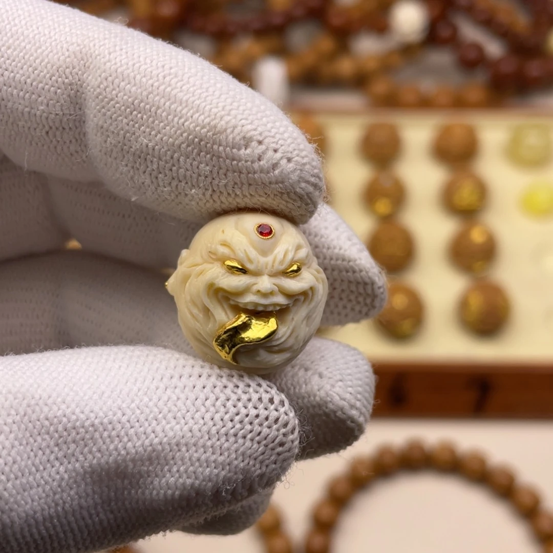 猴头核桃吊坠纯手工雕刻镶嵌足金999