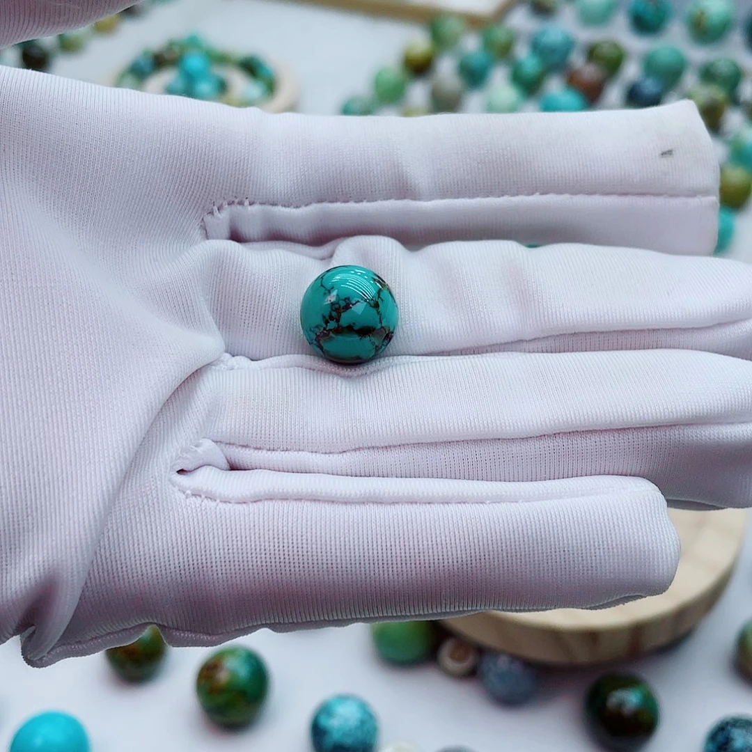 绿松石未镶嵌圆珠泰*