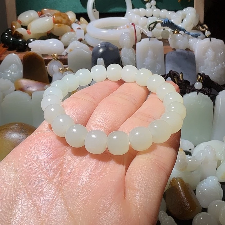 林***」和田玉未镶嵌车挂