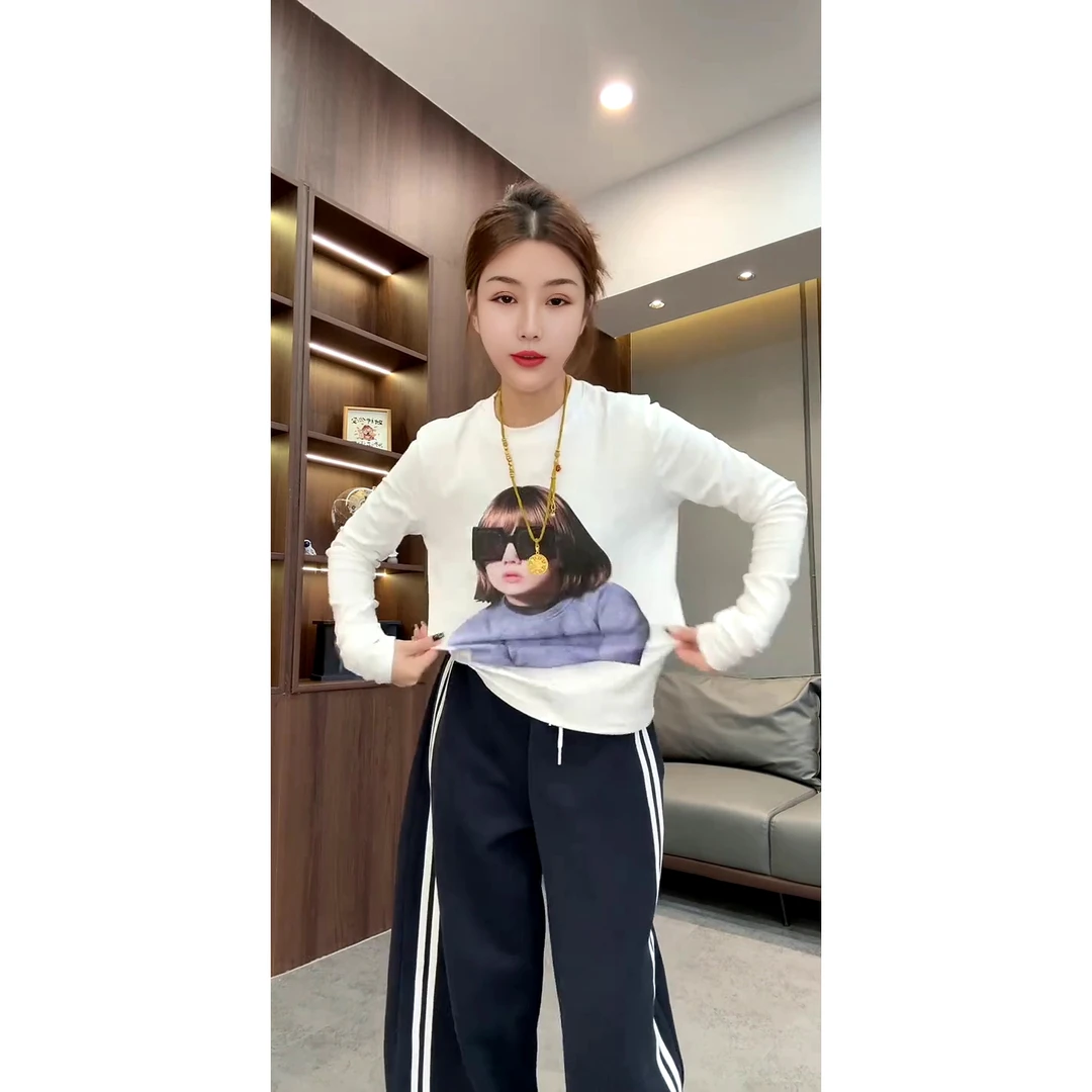 欧洲站时尚修身显瘦墨镜女孩印花圆领长袖T恤