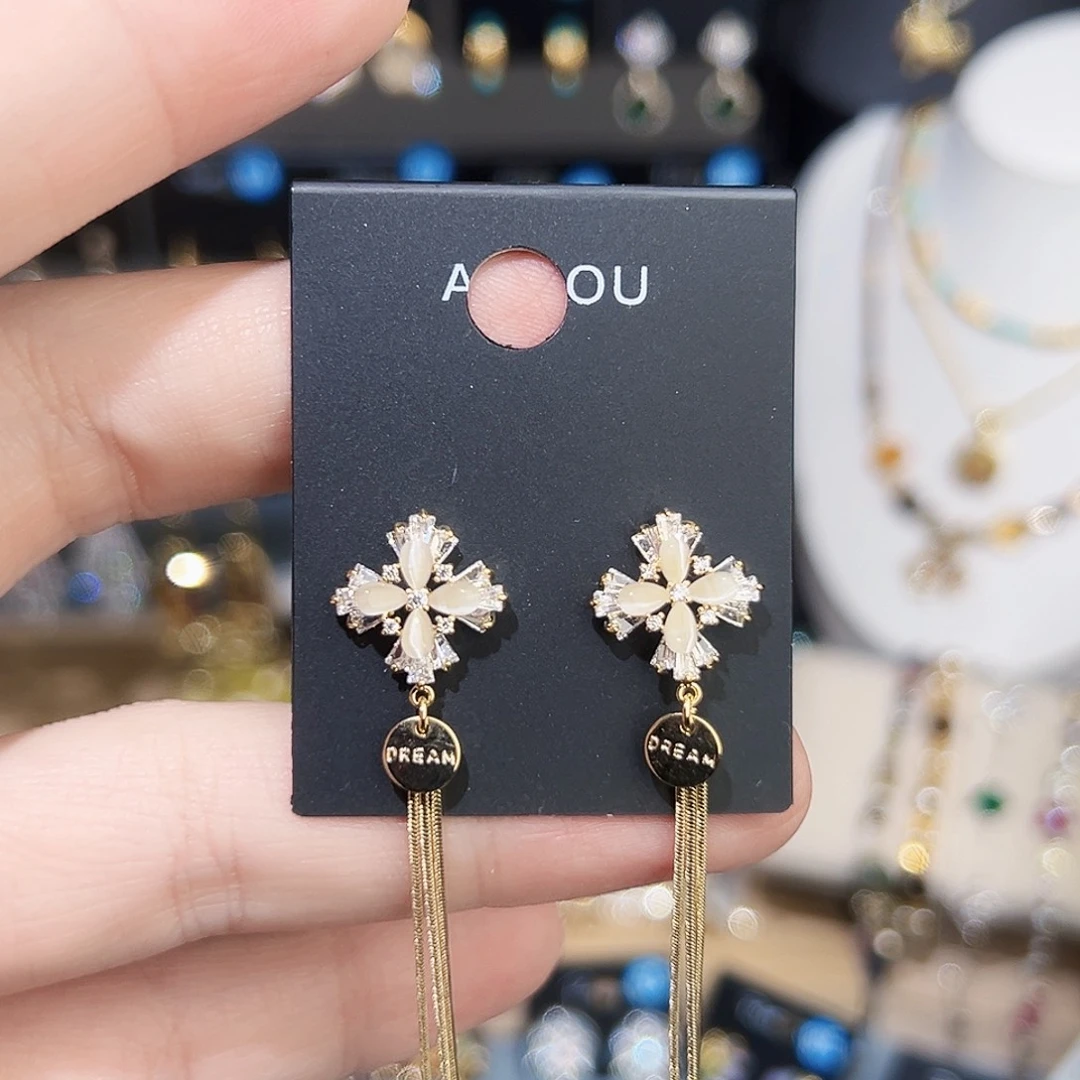 锆石铜合金925银阿豆家金色猫眼石十字流苏