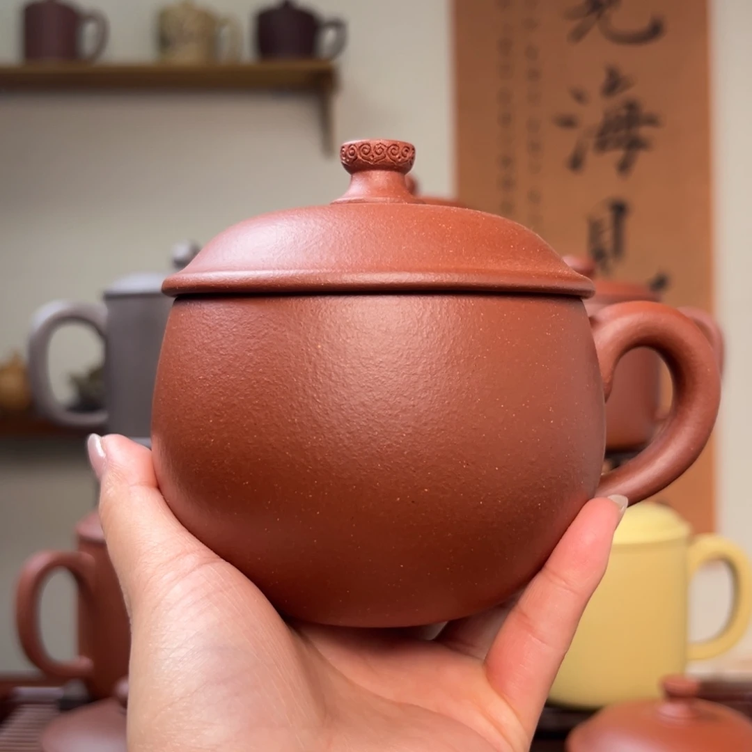 茶杯紫砂十**七微瑕紫砂盖杯红降坡