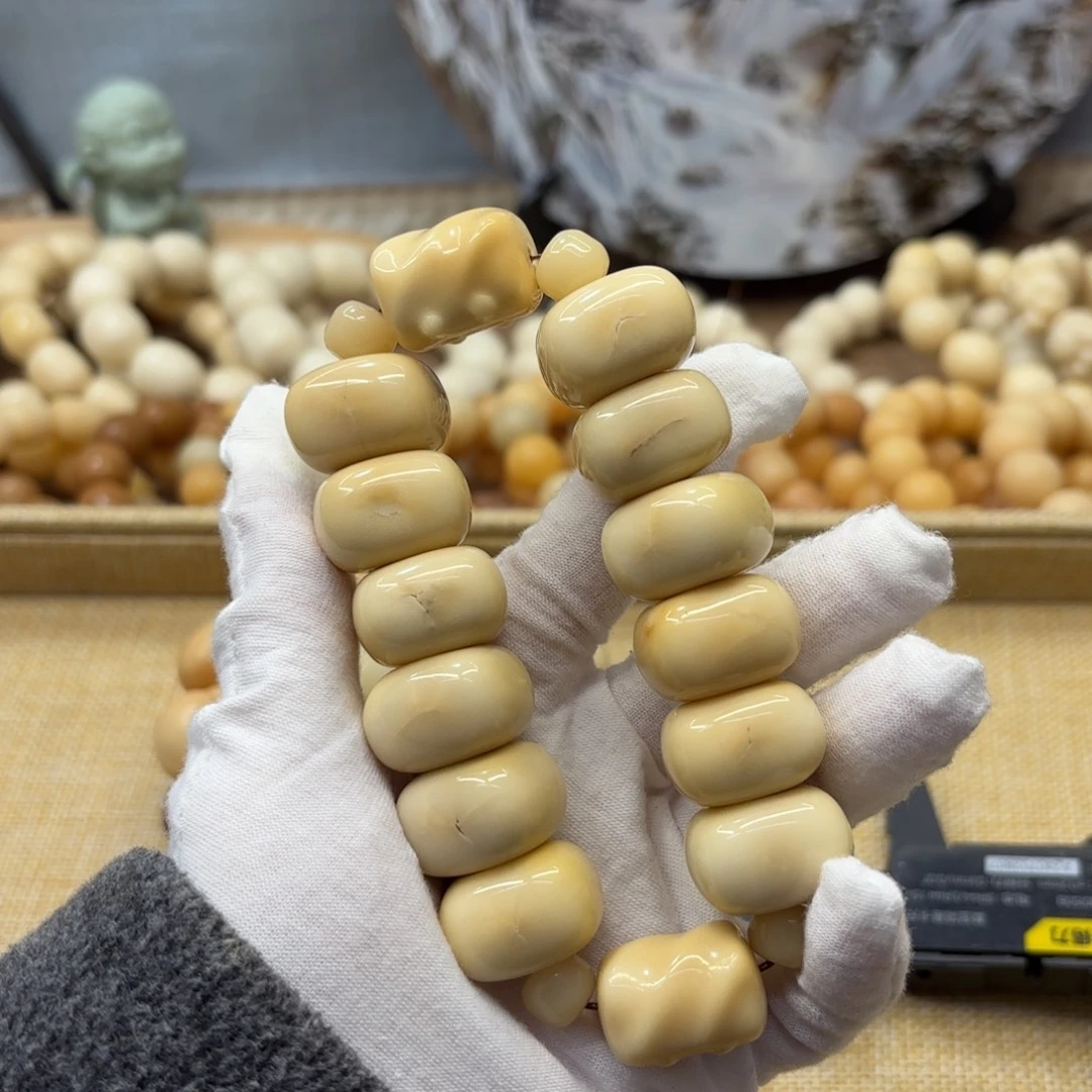 菩提根/象牙果吊坠牙果瑕疵机抛688