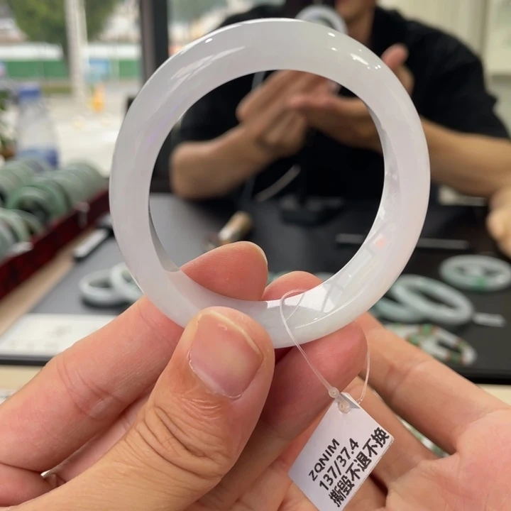 谭***翡翠未镶嵌手镯 53.8