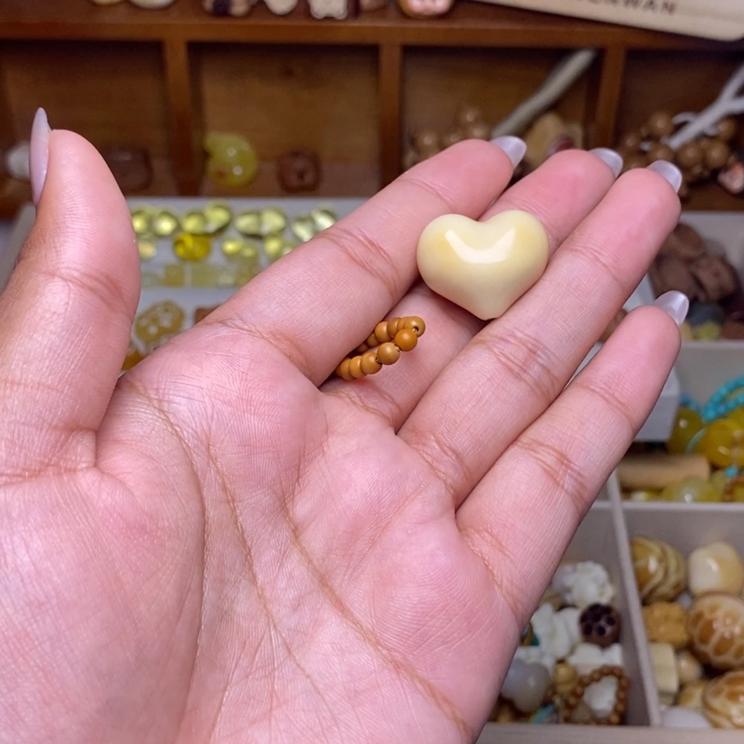 平***刘猴头核桃吊坠爱心 橄榄核卡