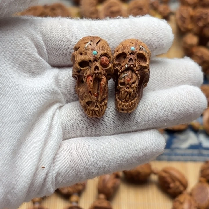 文***相桃核雕刻骷髅三通