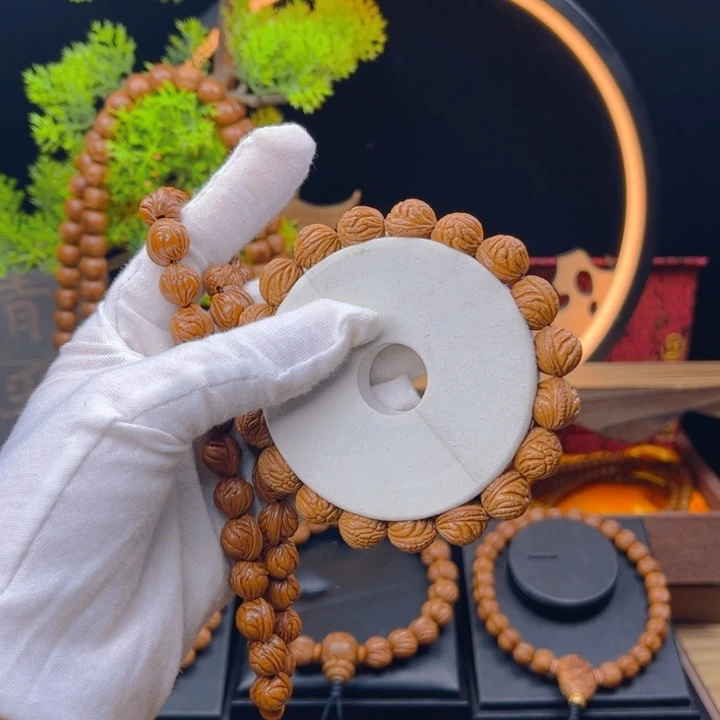 桃核吊坠0****0野生桃核小龙纹手持