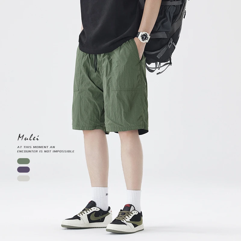 夏季2025薄款冲孔冰丝短裤男港风潮牌运动速干中裤宽松休闲五分裤