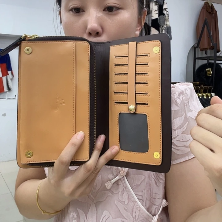 真皮牛皮手拿包咖啡色