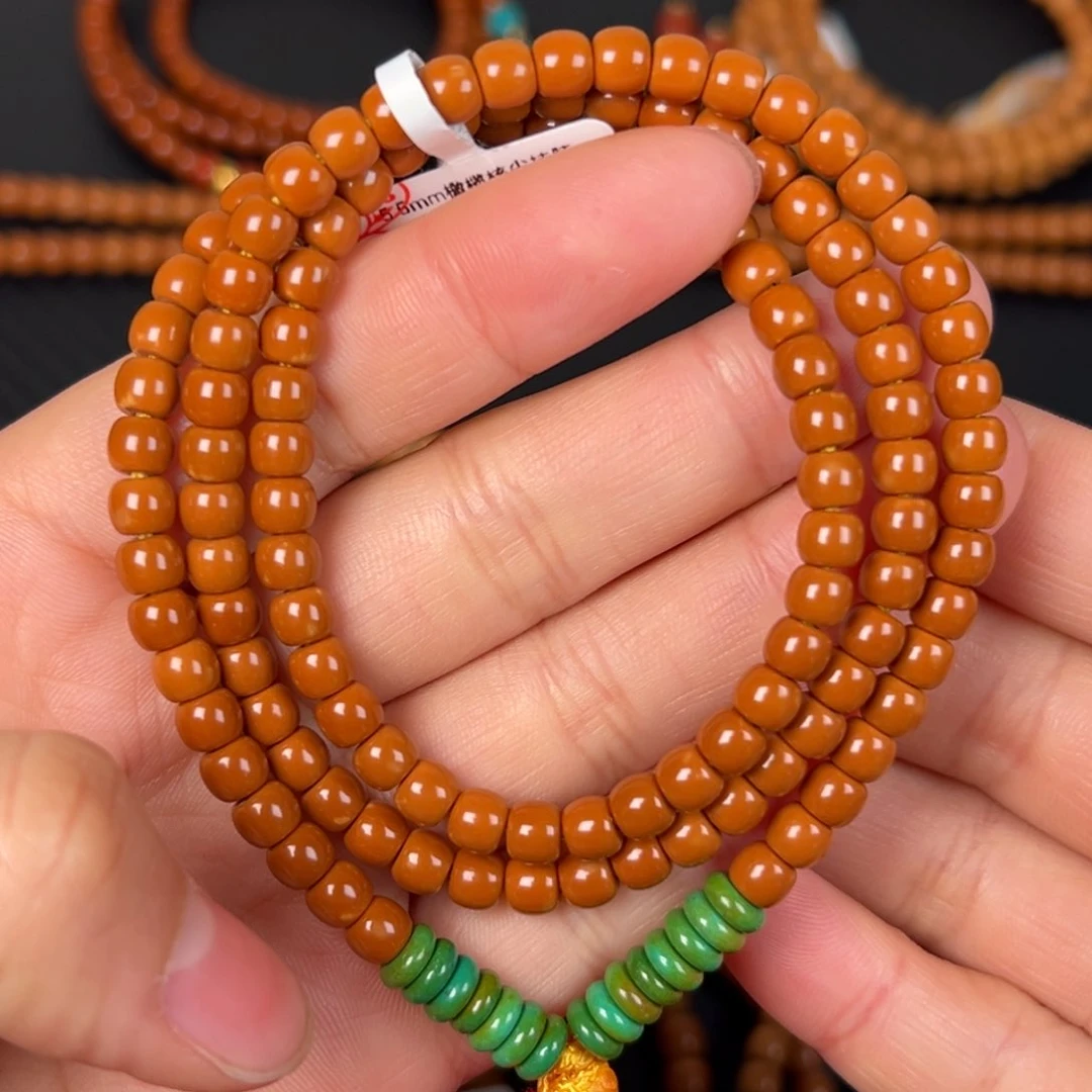 橄榄核把件橄榄核尖0.55极限弧挂脖