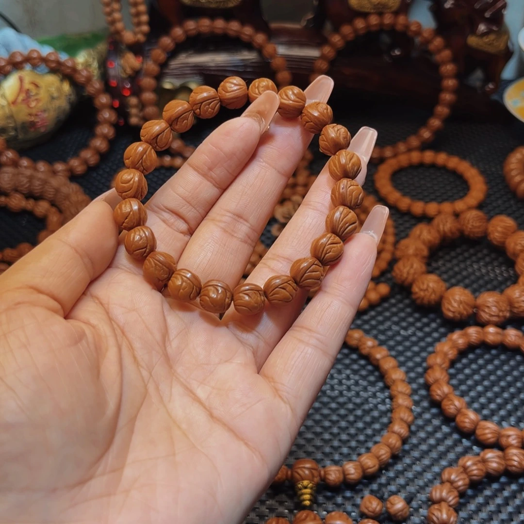 Б***о桃核手串10老树树籽玉龙脊单圈