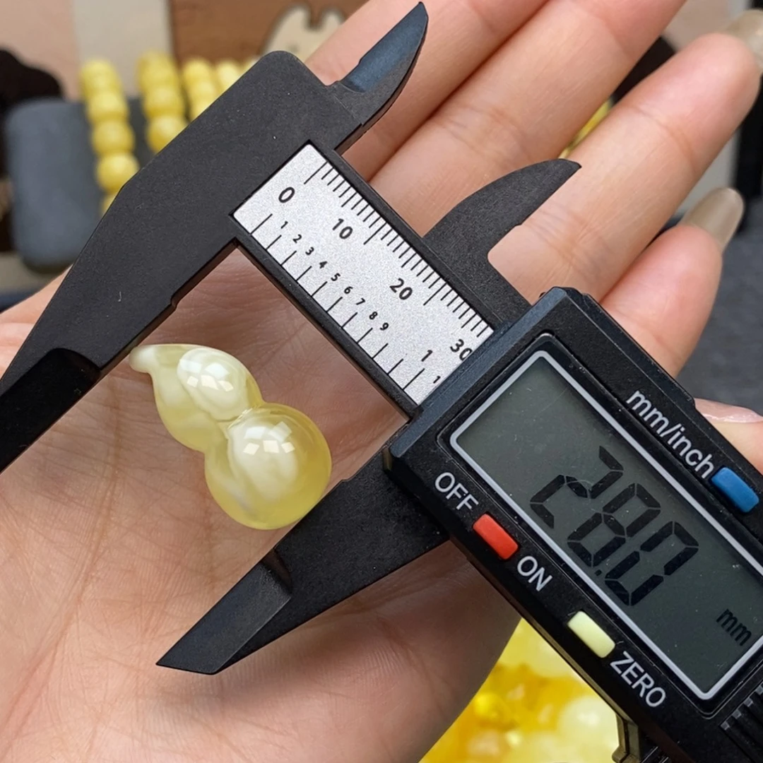 琥珀未镶嵌裸石白花蜜