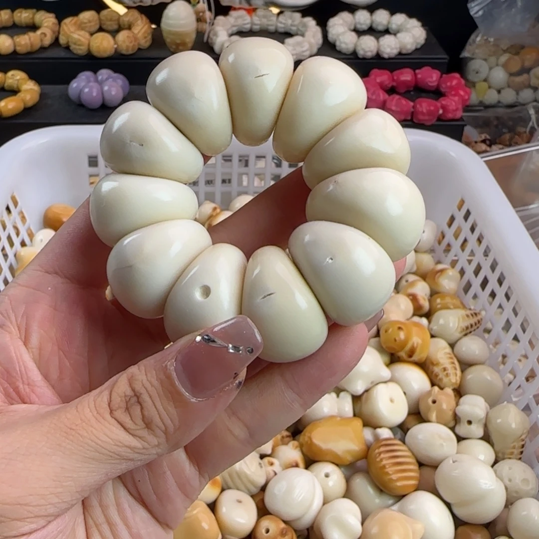 手串菩提根/象牙果瑕疵牙果卡26蒜瓣手捻1个有裂