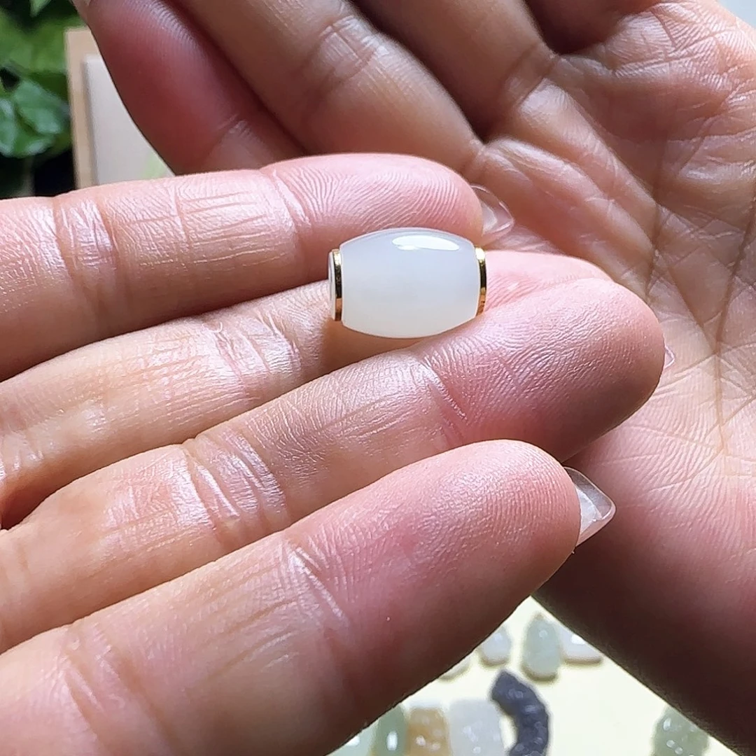 摩***°和田玉18K金镶嵌吊坠(赠链)