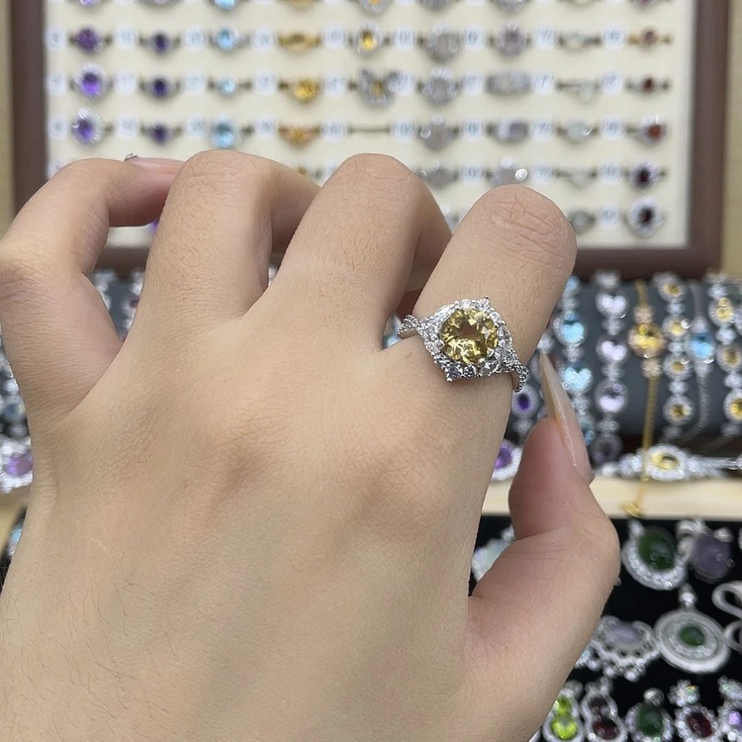 歖***、银S925镶嵌黄晶戒指