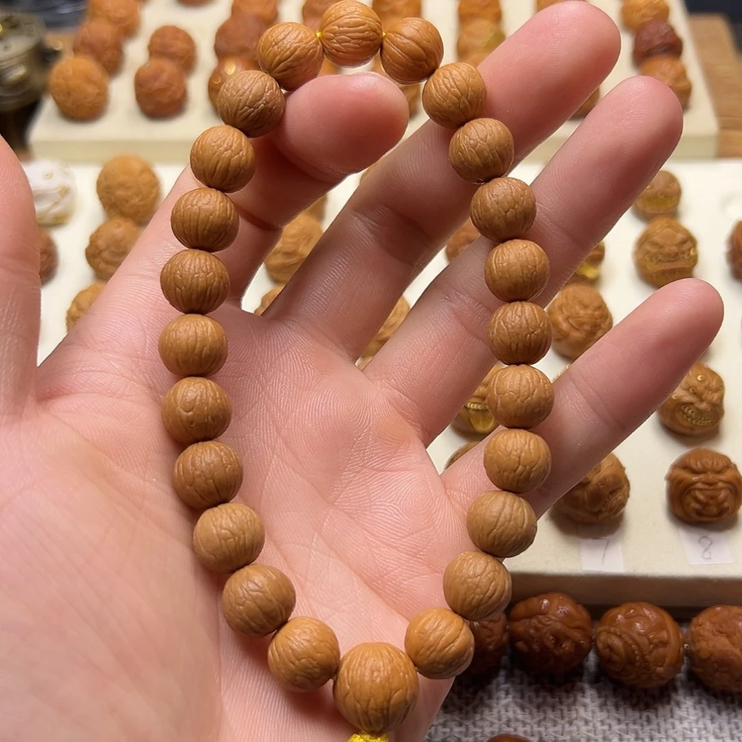 麻***子猴头核桃吊坠凤羽