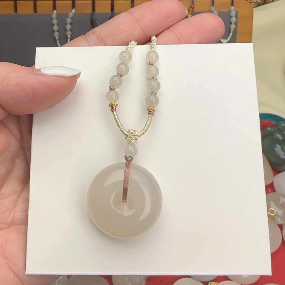 和田玉未镶嵌颈饰卢*库